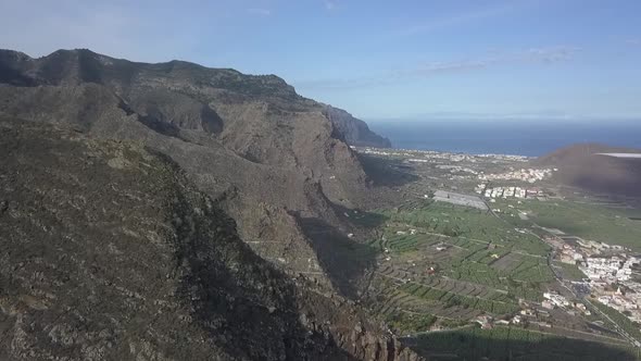Aerial view of city in mountains alt