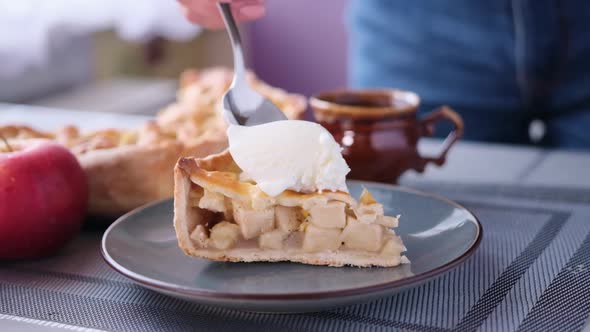 Apple Pice Cake Preparation Series  Woman Puts a Spoon of Ice Cream on Top of Piece of Cake