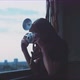 Woman photographer taking two pictures of a skyline - VideoHive Item for Sale