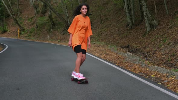Sporty Girl Skateboarding in the Park