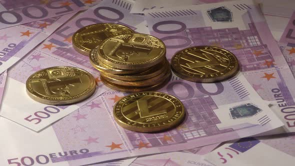 Lightcoins LTC Coins Rotating on Bills of 500 Euro Banknotes. Worldwide Virtual Internet
