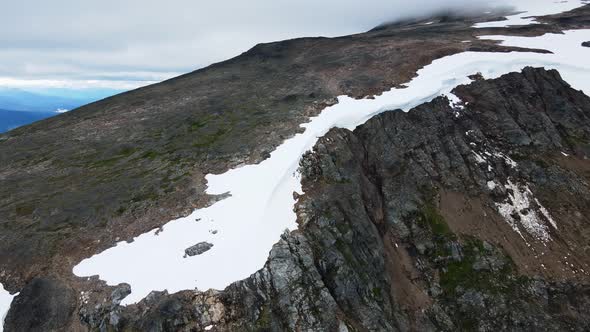 Wild and rugged mountain peaks surrounding Crater Lake in Britsih Columbia, Canada. Sweeping wide an