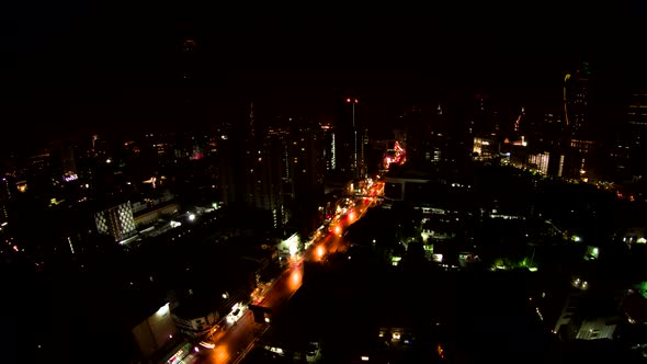 Rapid Traffic on the Main Street of a Metropolis at Night Timelapse with a Long Exposure