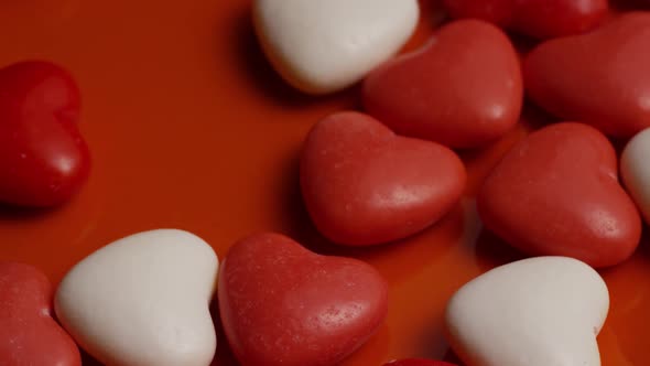Rotating stock footage shot of Valentines decorations and candies - VALENTINES 0055