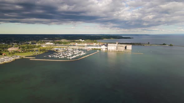 Aerial view of boat marina and port grain terminal on the coast of the lake Erie. Aerial view of por