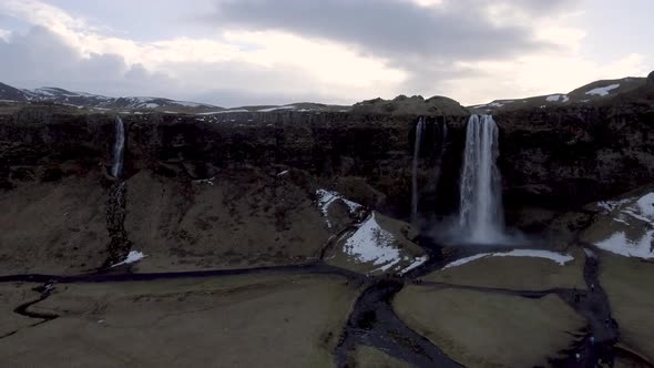 Seljalandsfoss waterfall in Iceland aerial panoramic view at sunrise