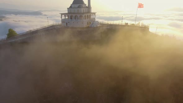 Rising Through the Mist Towards the Mosque