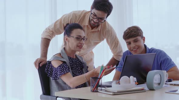 Group Meeting of Creative Business People Designer and Artist at Office Desk