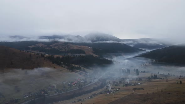 Winter Landscape Of The Carpathian Mountains In The Fog From A Bird's Eye View
