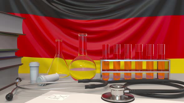 Clinic Laboratory Equipment on German Flag Background alt