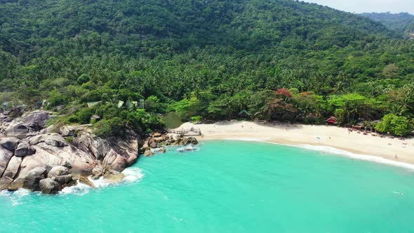 Aerial top view travel of beautiful shore beach journey by clear lagoon and white sand background of