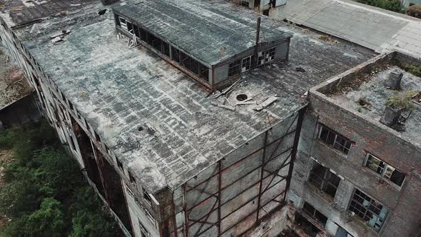 Abandoned ruined industrial factory building, ruins and demolition concept. Aerial view