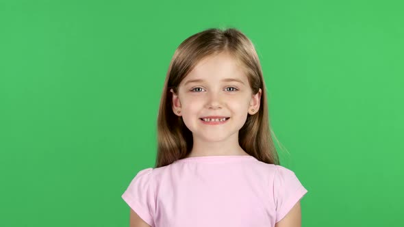 Child Genuinely Smile at the Camera. Green Screen