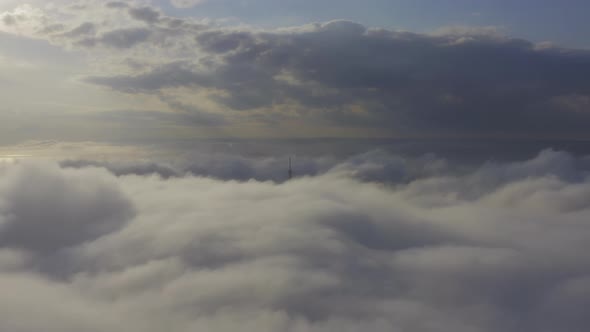 Aerial View of the Upper Part of the Broadcasting Tower in the Fog