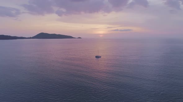 Aerial view Beautiful view sunset or sunrise over sea surface beautiful wave Amazing light twilight