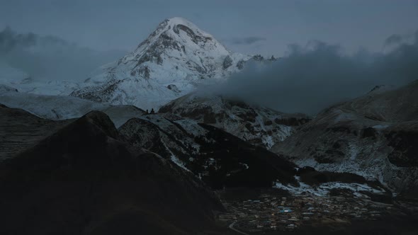 Mount Kazbek Covered Snow In Winter Sunrise