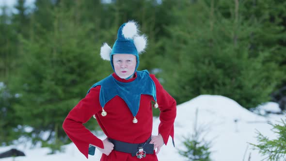 Angry Christmas elf putting his hands on his hips