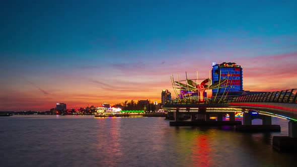 Time lapse: Vietnam Can Tho city skyline boats on Mekong River, pedestrian walkaway waterfront