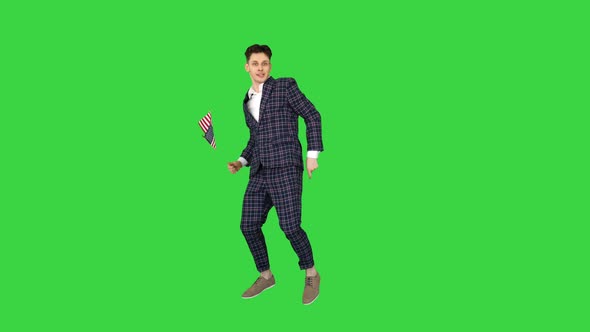Cool Man in Suit Does Crazy Dancing with American Flag on a Green Screen, Chroma Key.