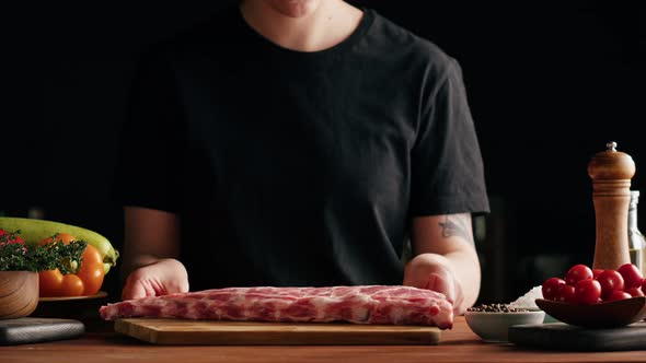 Woman Chef Cooking Ribs Closeup