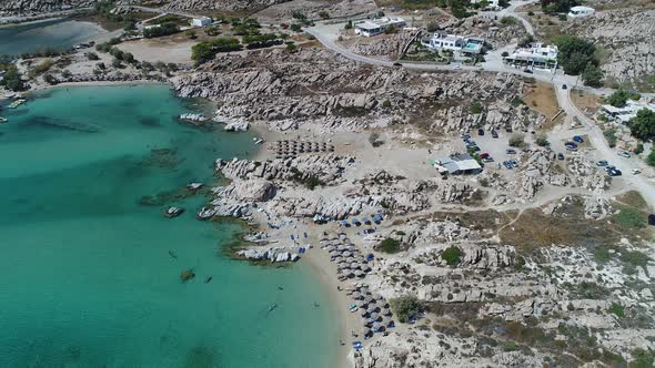 Piperi beach in Naoussa on Paros island in the Cyclades in Greece aerial view