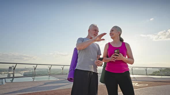 Friends with Mats for Yoga Stand on City Observation Deck