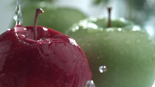 Water splashing on apples in slow motion; shot on Phantom Flex 4K at 1000 fps alt