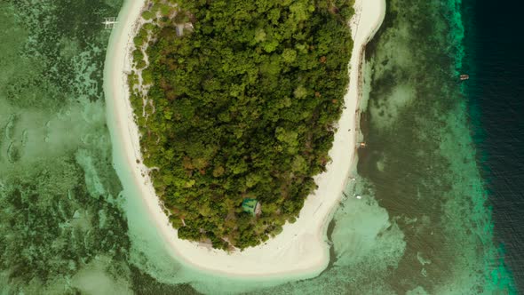 Tropical Island with Sandy Beach. Mantigue Island, Philippines