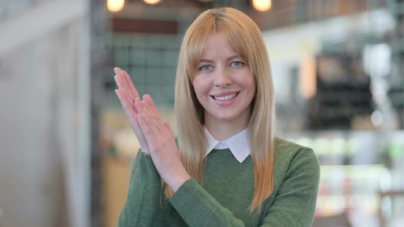 Portrait of Happy Woman Clapping Applauding