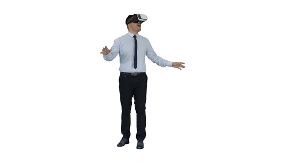 Astonished young businessman wearing VR glasses Concept