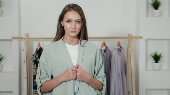 Pretty Lady with Loose Hair and Nice Smile in Fair Pantsuit