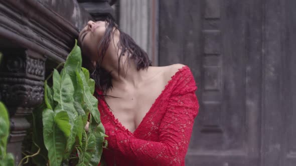 Stunning Young Woman In Red Dress At Temple