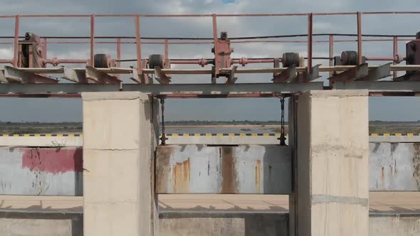 Aerial Dolly Back Through Barrage Watergate In Sindh Pakistan.