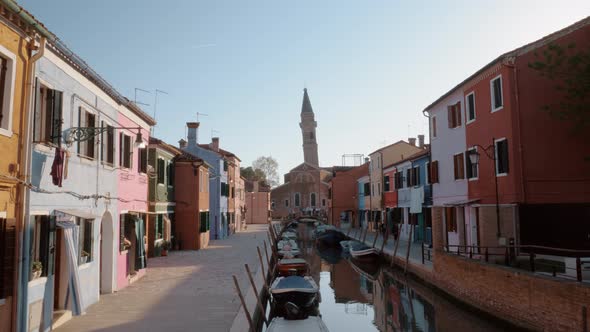 Burano island scene with Leaning Bell Tower, Italy