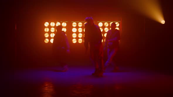 Team Dancers Enjoying Modern Dance in Show Stage