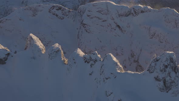 Aerial Panoramic View of Canadian Mountain Covered in Snow