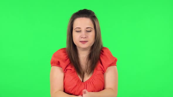 Portrait of Cute Girl Froze and Trying To Keep Warm. Green Screen