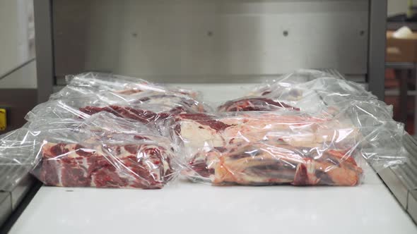 Meat Production the Process of Packaging Beef Meat Products in Plastic Packaging Thermal Packaging