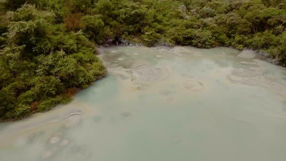 Bubbling Hot Mud Pool in Rotorua, New Zealand from Aerial View by Drone