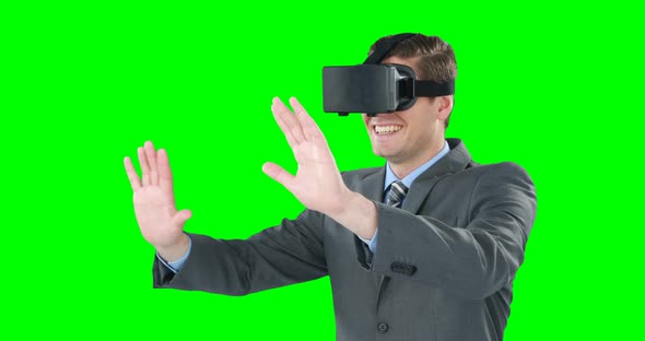 Businessman using virtual reality glasses