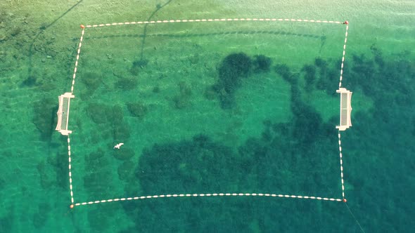 Abstract aerial view of water polo field, Sumartin, Brac island, Croatia.