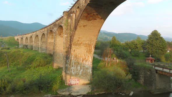 Ancient Railroad Bridge Over the River