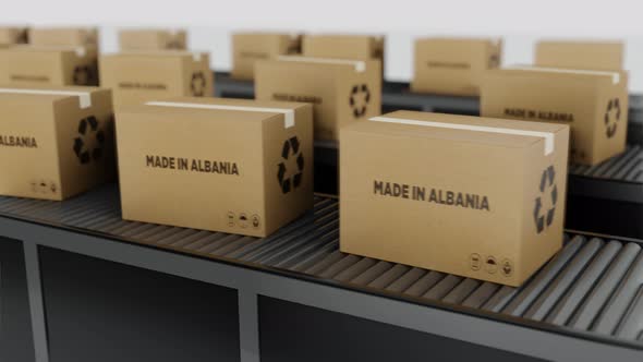 Boxes with MADE IN Albania  Text on Conveyor