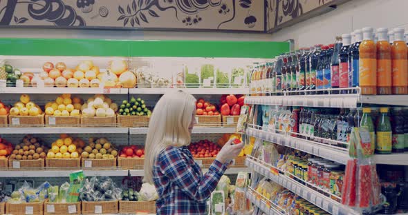 Woman Thinking What She Should Buy Next