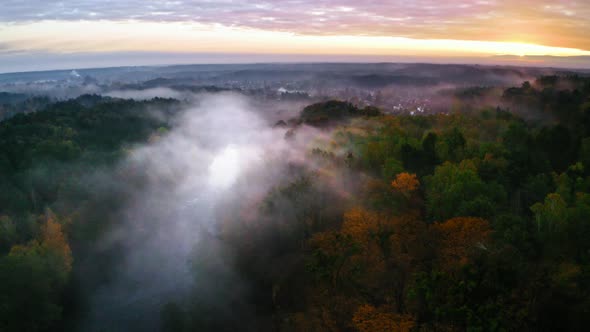 Foggy river and in autumn, view from above