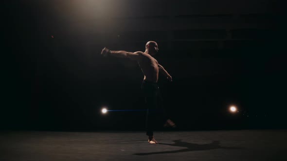 A Ballet Male Dancer is Performing Choreography on Classic Theater Stage