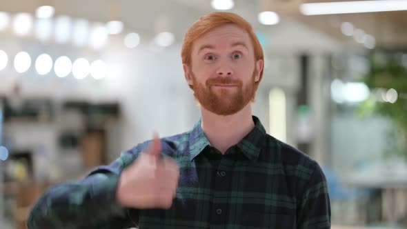 Portrait of Positive Beard Redhead Man with Thumbs Up Sign