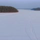 Flight Over a Taiga Forest Lake in Winter - VideoHive Item for Sale