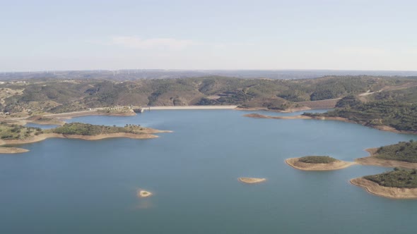 Aerial drone view of Barragem de Odeleite Dam reservoir in Alentejo, Portugal