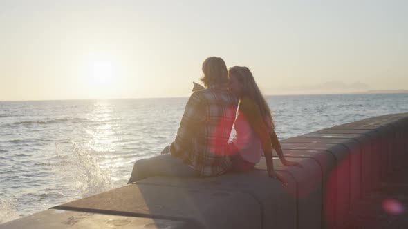 Caucasian couple enjoying their time seaside